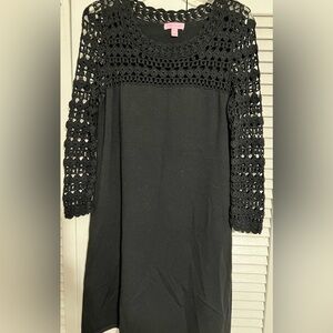 Lilly Pulitzer size large sweater dress. Black crochet Bodice and long sleeves.